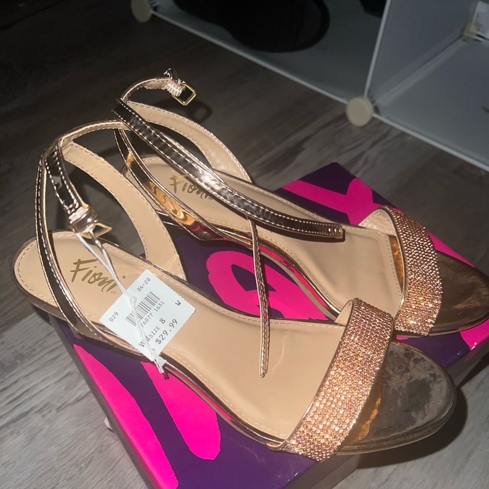 Rose gold kitten heels. Never worn. New in original box